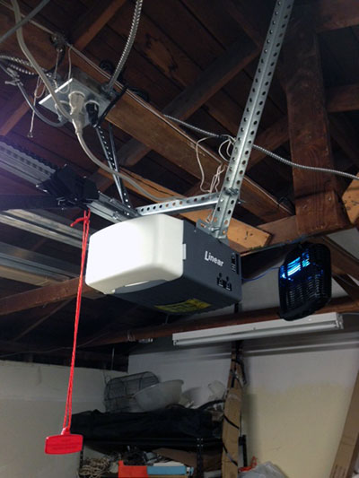 Linear garage door opener